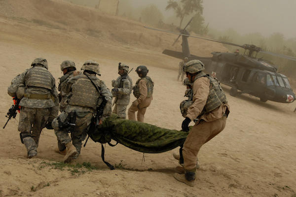 Image U.S. Army soldiers medically evacuate a wounded soldier.