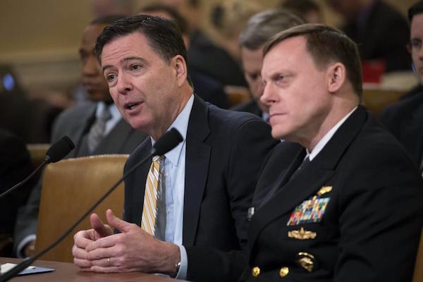 Image FBI Dir James Comey and NSA Dir Mike Rogers testify before House Intel Committee MAR 20